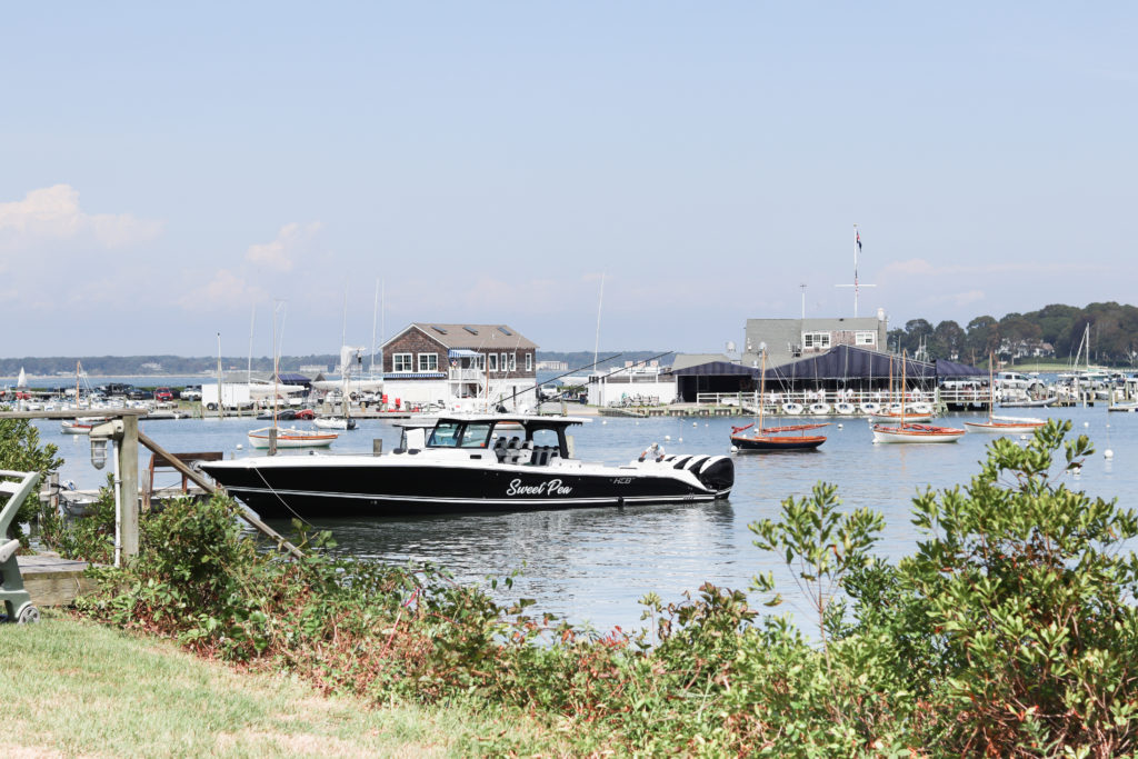 A small harbor with boats in Greenport, NY- a popular road trip destination