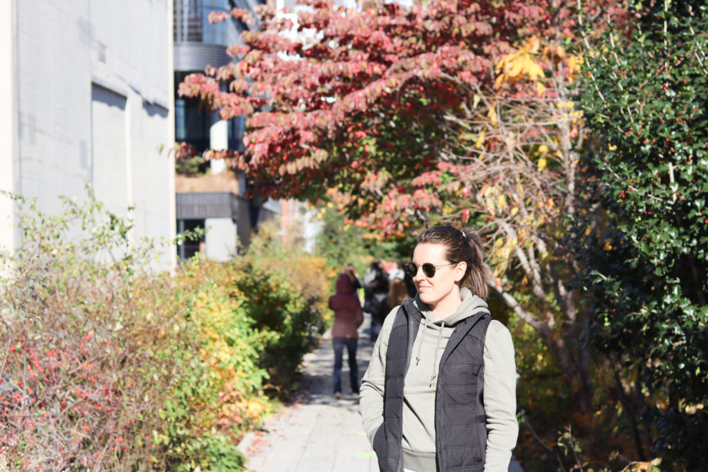 Woman standing on the High Line for Instagram photo 