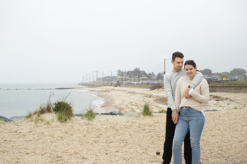 Couple standing on a beach in Oak Bluffs, Martha's Vineyard