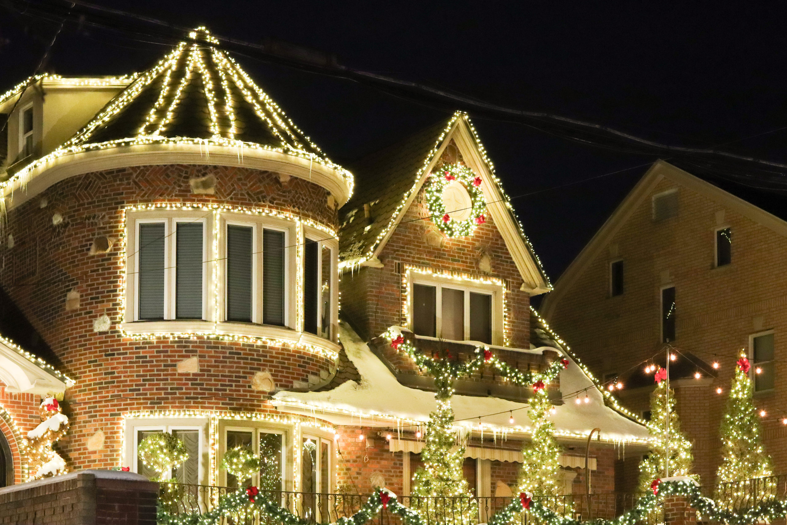 A house completely decorated for Christmas.
